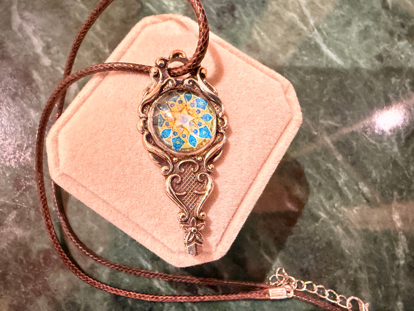 Spoon Pendant With Blue Emblem